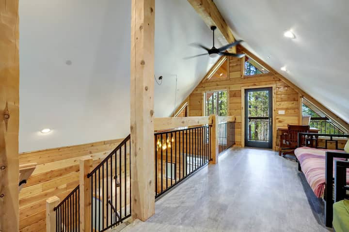 Inside Redwood Home complete upper loft with vaulted ceilings