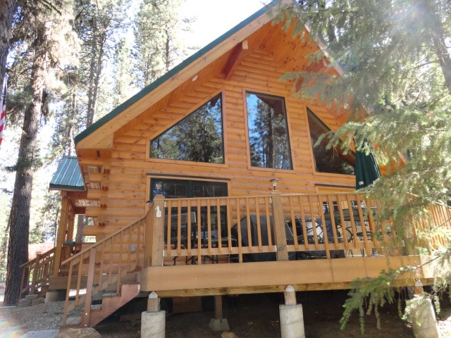 Evergreen home front porch with windows