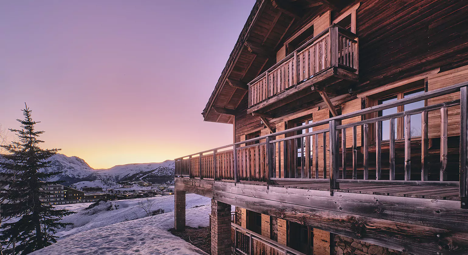 Modern Amenities in Traditional White Log Cabins